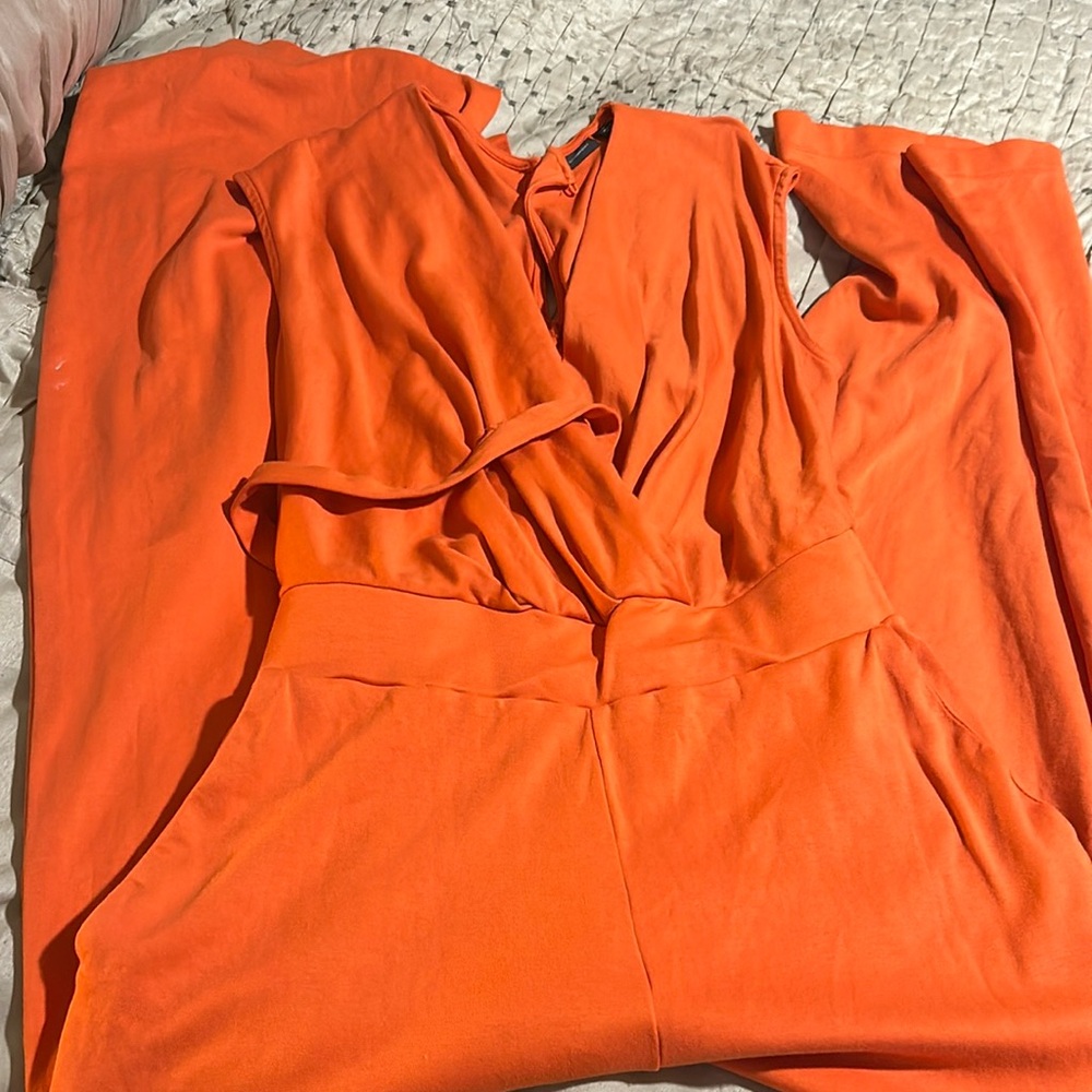 Orange NY and Company low cut jumpsuit